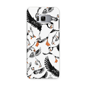 Delightful puffin design for a Samsung S8  phone case, puffins are flying around and have vibrant orange beaks and feet.