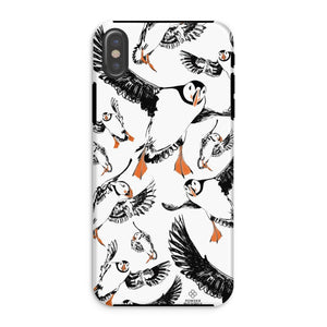 Delightful puffin design for an iPhone XS phone case, puffins are flying around and have vibrant orange beaks and feet. 