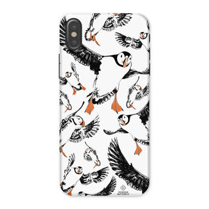 Delightful puffin design for an iPhone X phone case, puffins are flying around and have vibrant orange beaks and feet. 